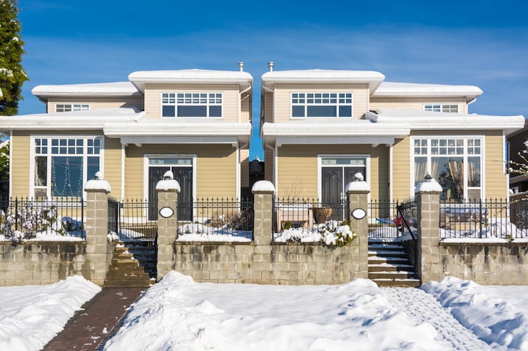 residential-duplex-house-with-front-yard-snow-winter-sunny-day-canada_769578-2154